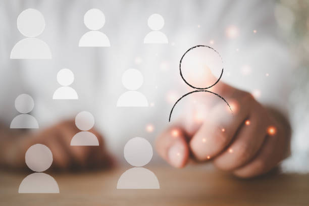 istock Human resources (HR) management concept on a virtual screen interface in background and icons about recruiting, technology, data, training. Management recruitment employment headhunting concept. 1339489560