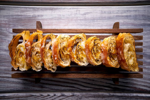 istock Sliced grilled farton pastry in a row 1339492137