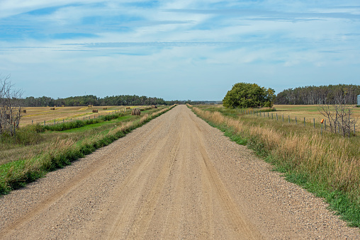 A gravel road with diminishing perspective