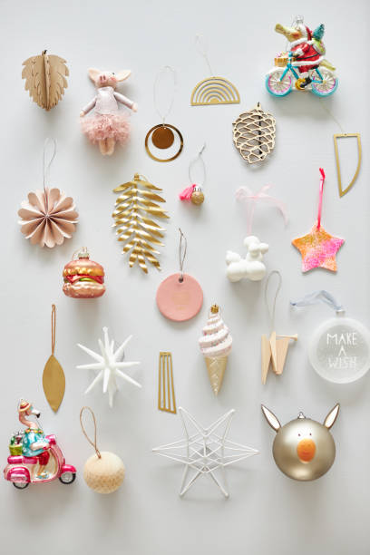 istock Various modern Christmas tree tags or Christmas tree decorations arranged as a flatlay on a light background 1339516317