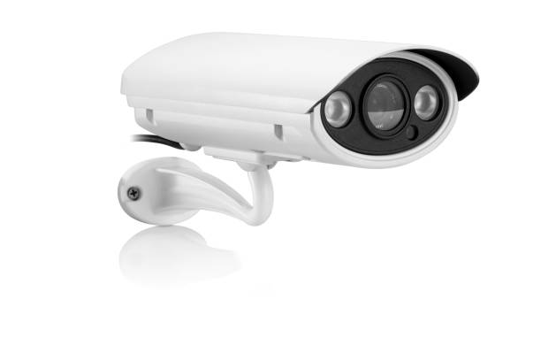 istock Three quarter view of modern white outdoor security camera, isolated 1339520656