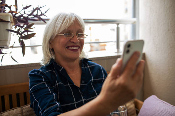 istock Talking to Her Family 1339523772