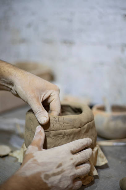 istock Hands of a potter 1339524099