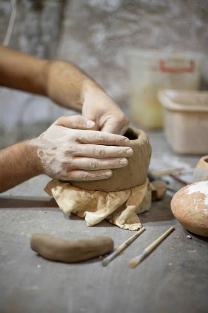 istock Hands of a potter 1339524105
