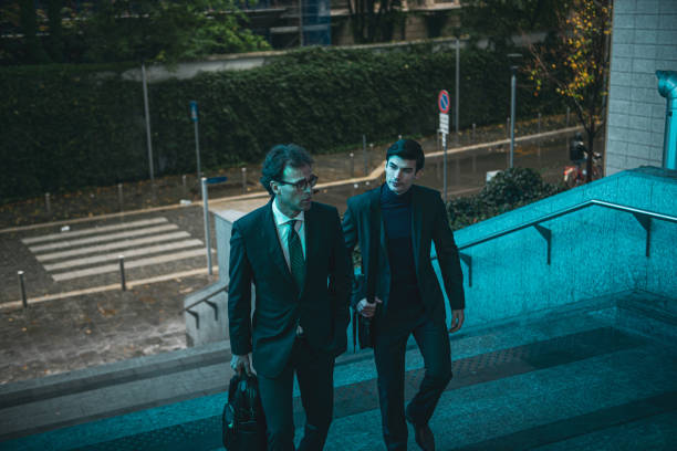 Shoot of two colleagues elegant dressed coming to work