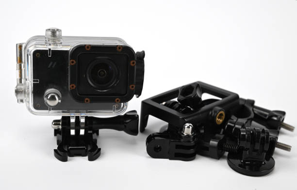istock Action camera inside a transparent waterproof box on a stand next to a bunch of accessories 1339528862