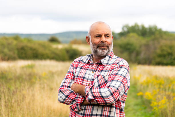 Portrait of a mature mixed race man Portrait of a mature man outside in the countryside on a fall day. man beard plaid shirt stock pictures, royalty-free photos & images