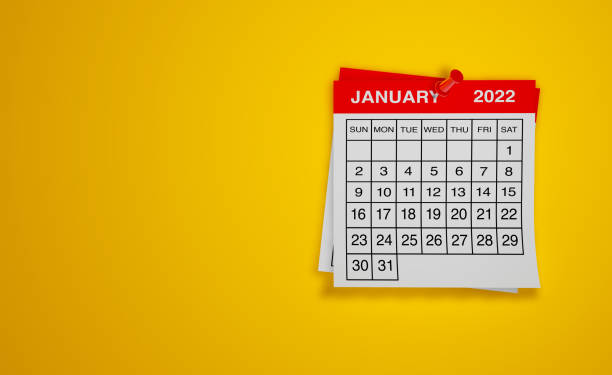 January 2022 calendar on yellow background January 2022 calendar on yellow background january stock pictures, royalty-free photos & images