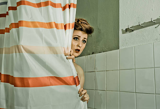 Scared at the shower... Scared woman with knife - vintage toning women screaming surprise fear stock pictures, royalty-free photos & images