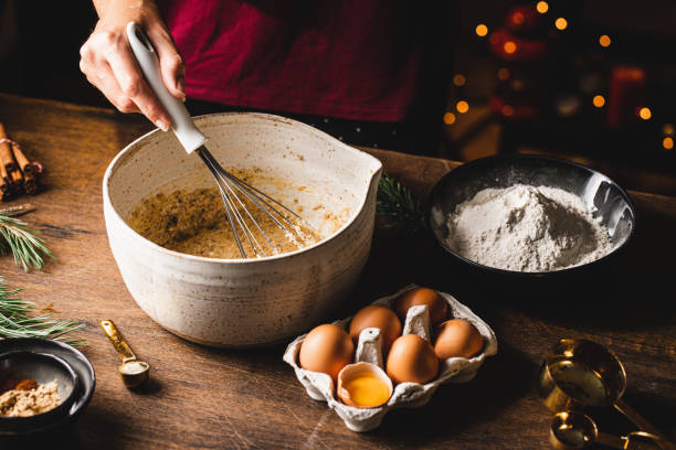 istock Hands whisking egg with butter and brown sugar mix 1339535850