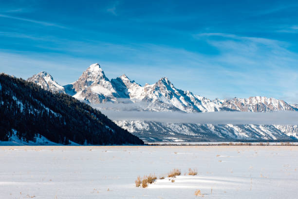 Storm clouds breaking over the grand Teton