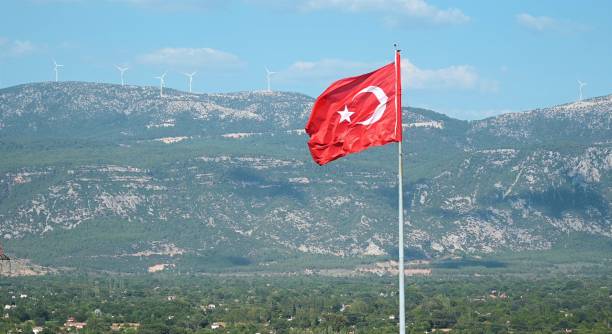 istock Turkish flag waving on the wind at high. 1339543761