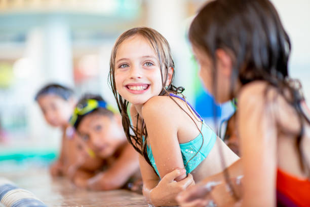 istock Smiling Caucasian girl during swimming class 1339552005