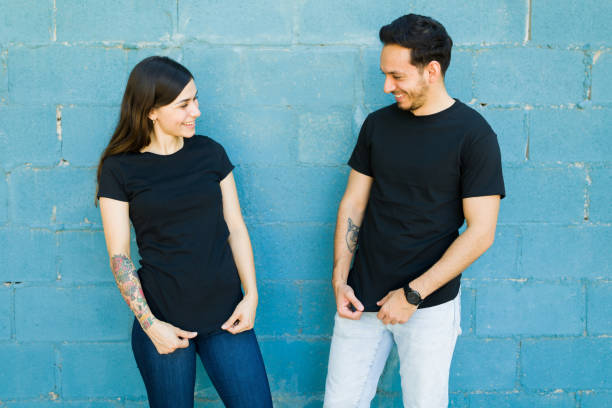 istock Girlfriend and boyfriend with custom print t-shirts 1339552115