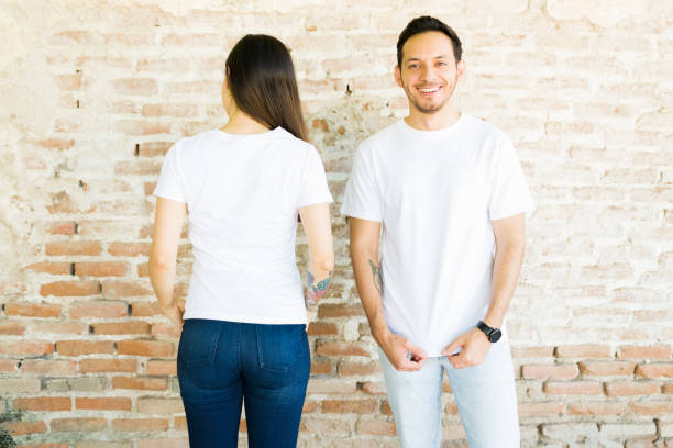 istock Attractive couple made custom t-shirts 1339552182
