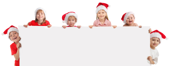 Happy kids  in christmas caps, holding the banner in his hand