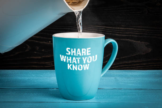 Share What You Know. Text on a blue coffee mug