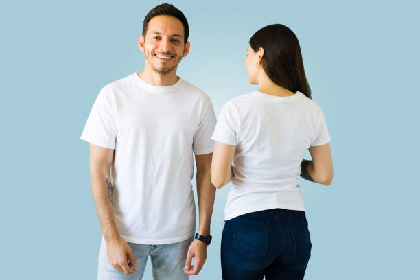 istock Hispanic couple made custom t-shirts 1339560692