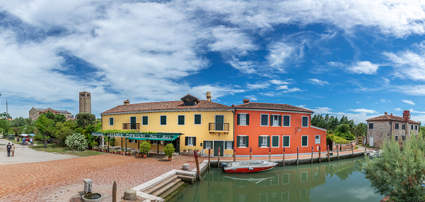 Torcello, Italy - July 5, 2021: central village square at the small island of Torcello in the lagoon of Venice, Italy.