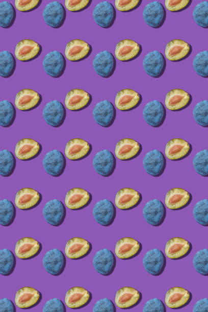 istock Plums on a purple background 1339588389