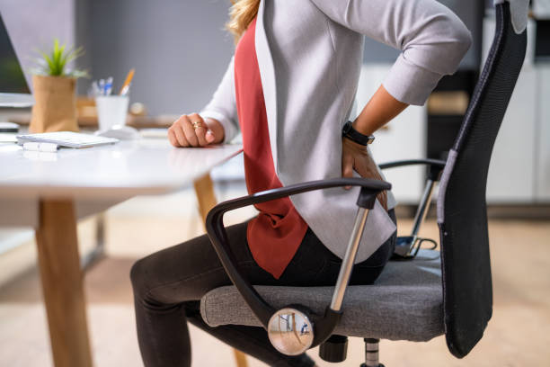 istock Back Pain Bad Posture Woman Sitting 1339597062