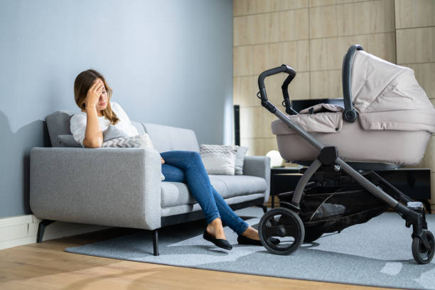 istock Depressed Unhappy Woman With Newborn 1339598200