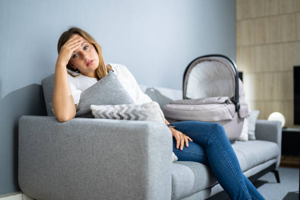 istock Depressed Unhappy Woman With Newborn 1339598205