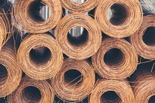 istock Mesh wire rolls of iron stainless steel, galvanized metal sheets construction material. Chicken wire mesh rolls farm fence. Net wire mesh roll engineer Construction galvanize malleable steel storage 1339599231