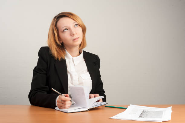 istock Young red-haired businesswoman 1339603086