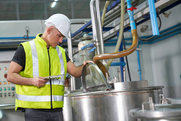 istock Caucasian male engineer check boiler machine before start proces 1339604538