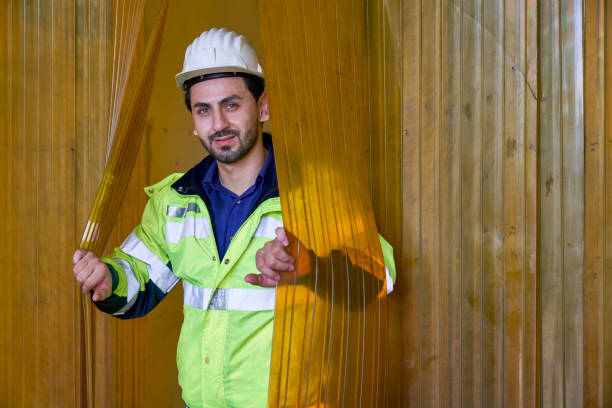 istock Portrait smart engineer open the Plastic curtain and smile in un 1339605934