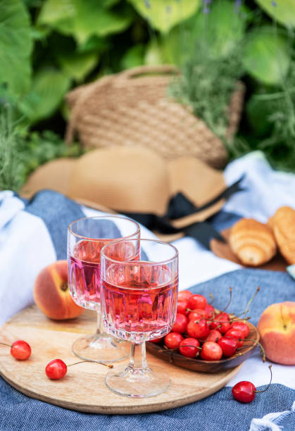 istock Set for picnic on blanket in lavender field 1339606187