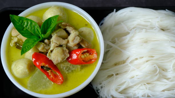 istock Green curry chicken and fish ball with rice noodle 1339606952