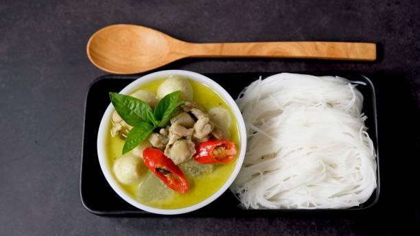 istock Green curry chicken and fish ball with rice noodle 1339606956