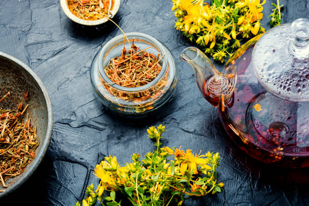istock Flower with green leaves hypericum,herbal medicine 1339608898
