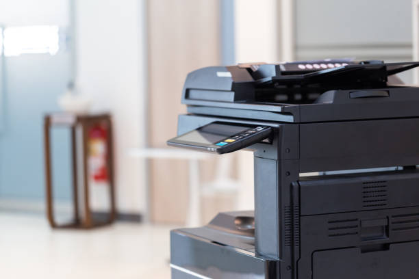 istock photocopier or network printer is office worker tool equipment for scanning and copy paper. 1339614722