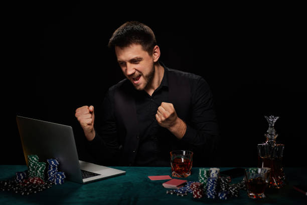 istock Bearded online casino player man celebrating victory 1339618338