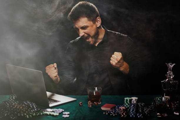 istock Bearded online casino player man celebrating victory 1339618389