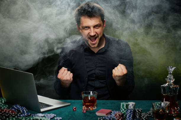 istock Bearded online casino player man celebrating victory 1339618422