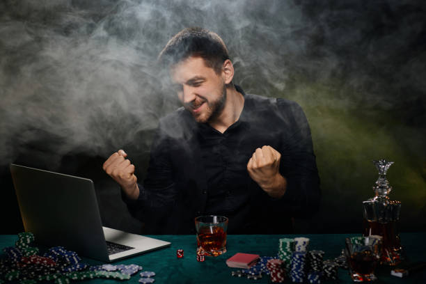 istock Bearded online casino player man celebrating victory 1339618431