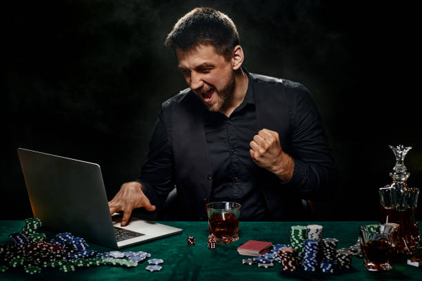 istock Bearded online casino player man celebrating victory 1339618432