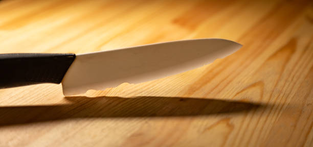 istock old white ceramic knife with a broken blade. broken substandard knife 1339620669