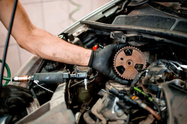 istock Auto mechanic working on car engine in mechanics garage 1339626568
