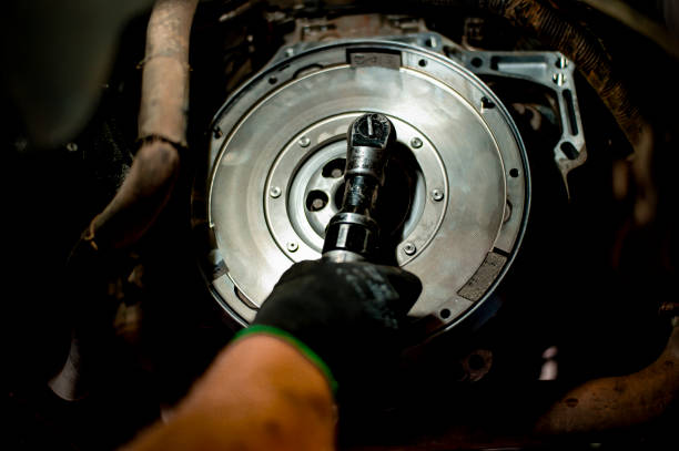 istock Auto mechanic working on car engine in mechanics garage 1339626682