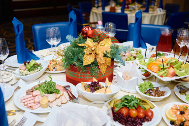 istock Table setting with white plates , blue serviettes and cutlery on table, copy space. Place setting at Christmas party. Table served for New year banquet in restaurant 1339628606
