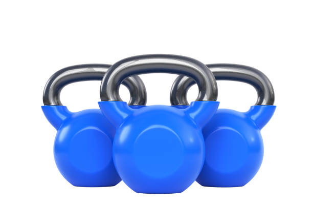istock Three blue kettlebells isolated on white background standing close to each other. 1339628650