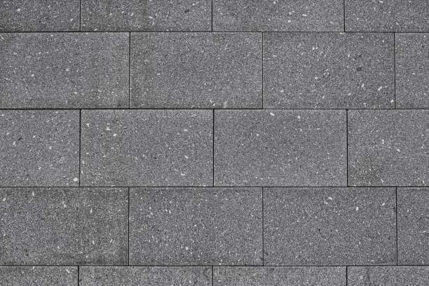istock Grey old granite block texture. Gray stone tile brick wall. Abstract grunge background 1339628662