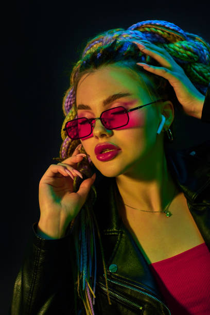 istock young woman with dreadlocks in red sunglasses 1339629455