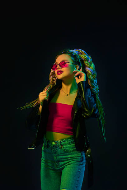 istock young woman with dreadlocks in red sunglasses dancing 1339629503