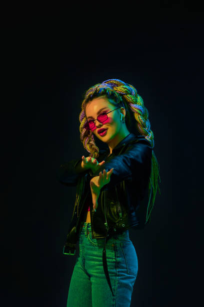 istock young woman with dreadlocks in red sunglasses dancing 1339629507